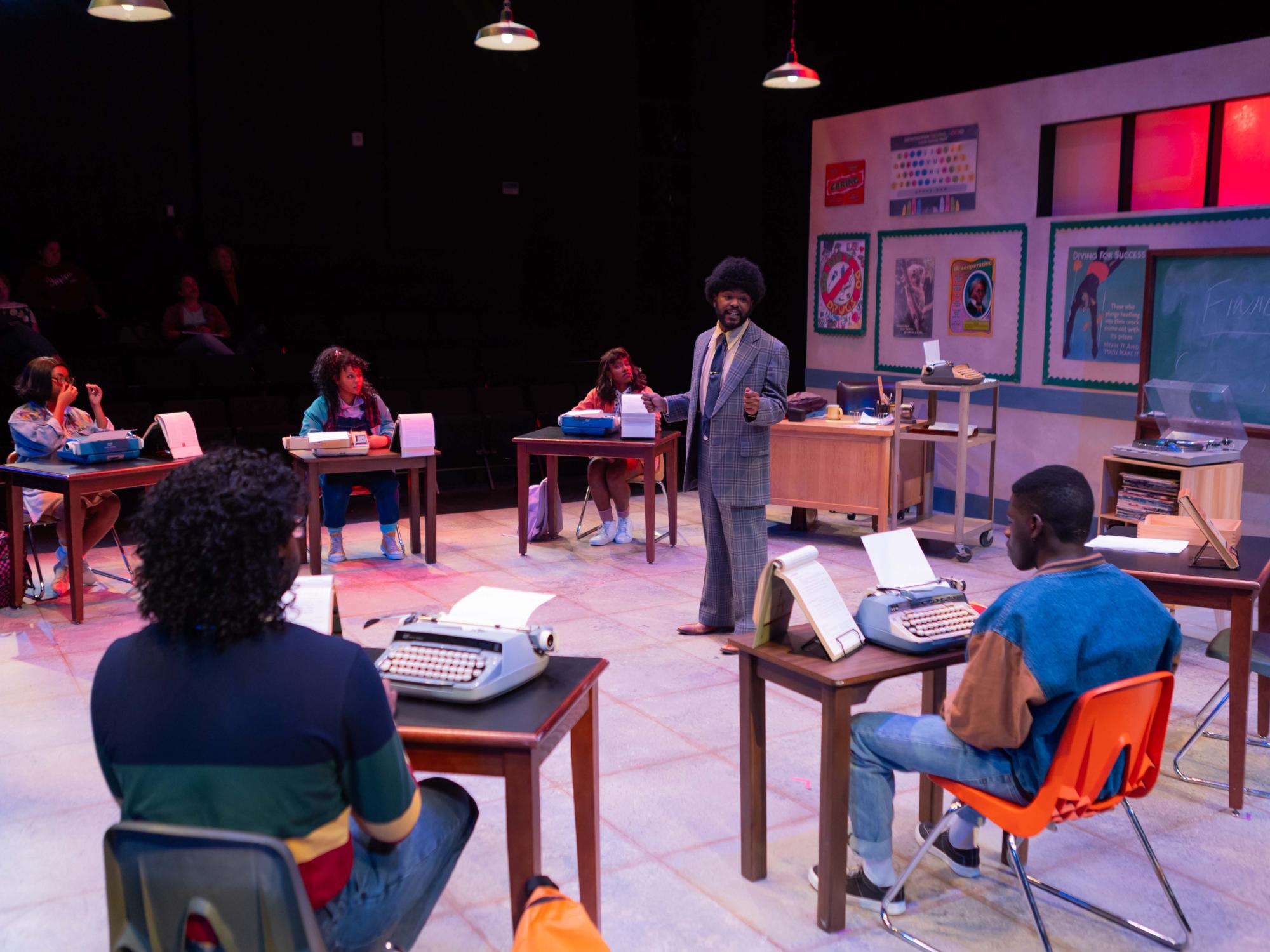 A new student joins the class of Touchless, played by Howard Hall. From a gang-ridden area, Khalia Sacko as Reggie stirs the pot in his new classroom with his typing skills.