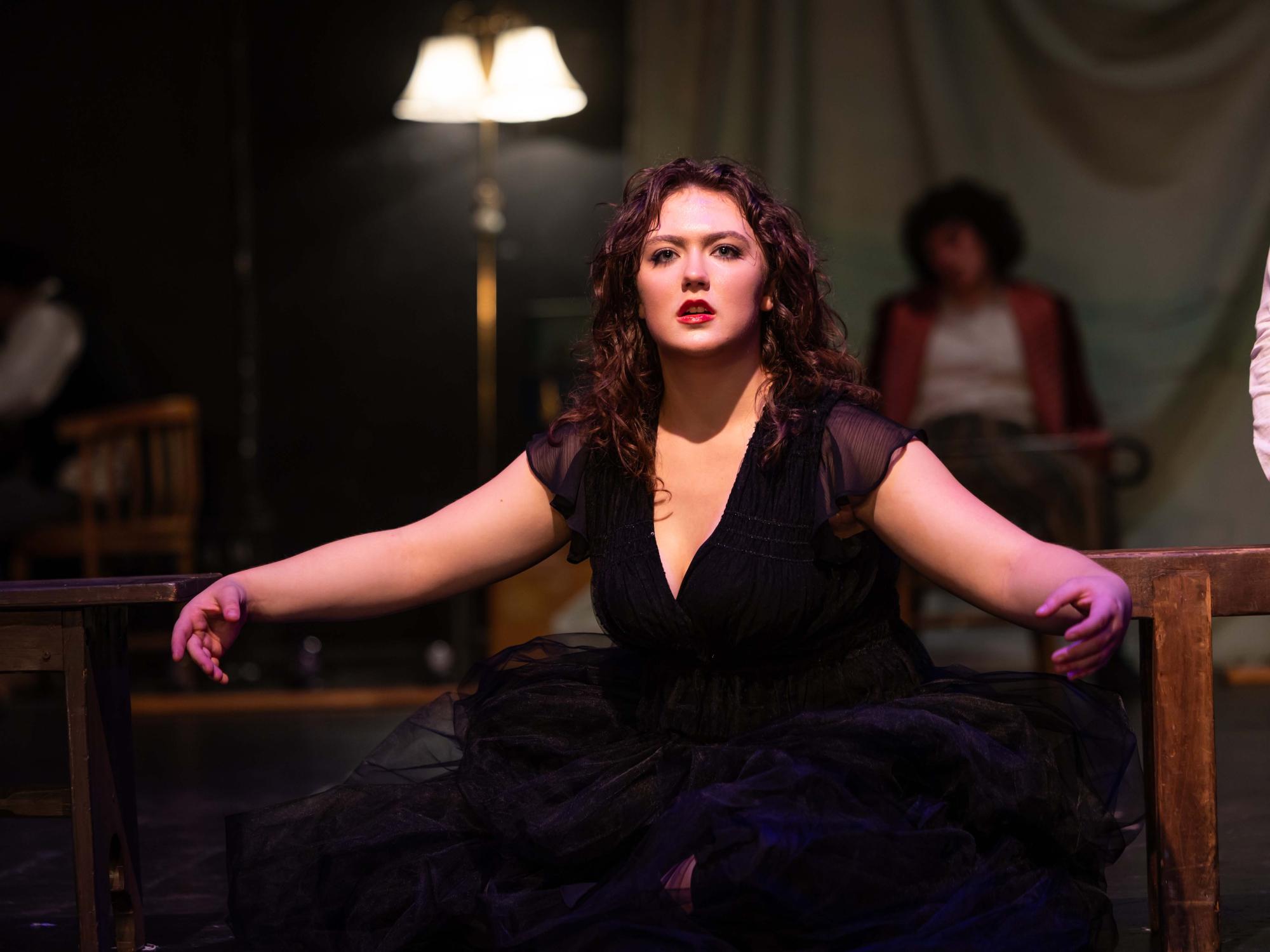 Dared by Nina to perform Treplev's play, Masha, portrayed by Mackenzie Mann, takes on her goose form to take the stage.