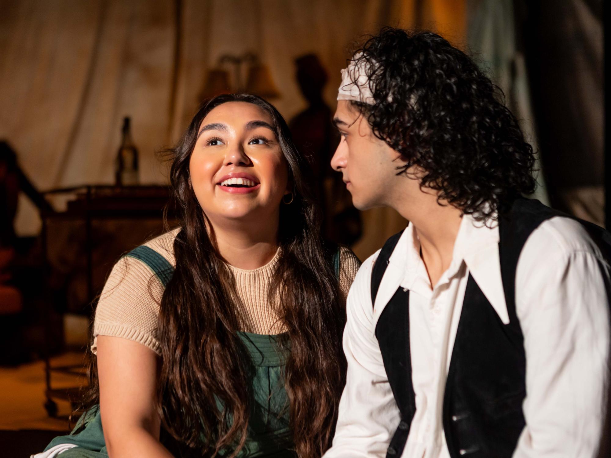 Yakov, played by Esmeralda Trevino, sits next to an injured Treplev, Adam Flores Jr. They discuss what they could've explored and built other than a theatre. What else is out there...