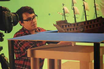 student working with special effect boat