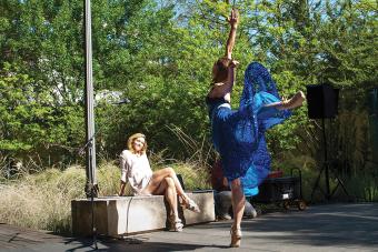 Dorothy O'Shea Overbey watches a dancer perform for a Planet Texas 2050 event