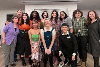 Nine UTeach Theatre graduates pose with three UTeach Theatre faculty, all smiling