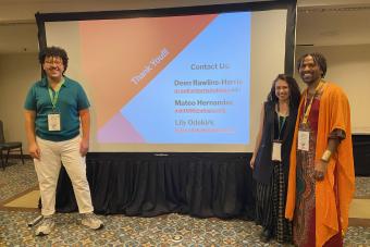 Mateo Hernandez, Lily Odekirk and Deen Rawlins-Harris pose together after their presentation