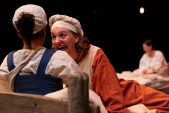 Ella Eavenson as Hunna continues her unwelcome welcome to Nicole as Lana Lesley as Lady Marguerite stirs in the background.