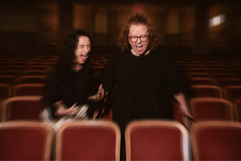 Photo of Kimberly Belflower and Danya Taymor screaming in theatre seats